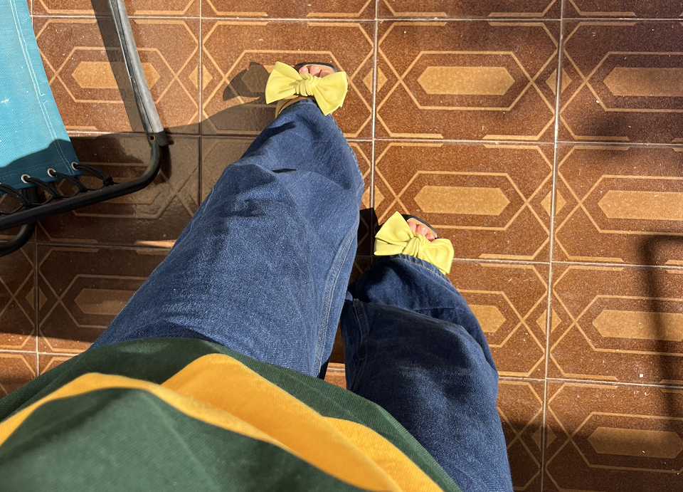 top view of jeans outfit wearing the Lazo Charm Kitten heels