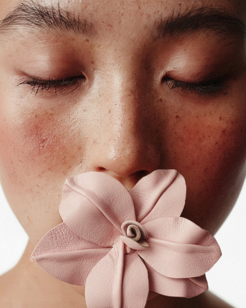 Asian woman with leather Charm Lirio 